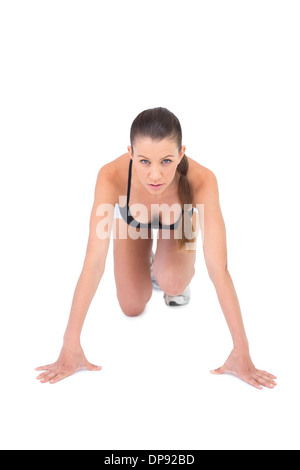Fit Woman Sportswear Vorbereitung für Rennen konzentriert Stockfoto