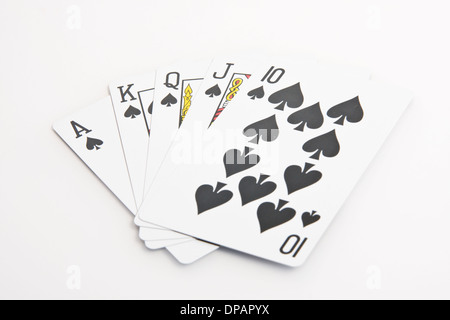 Pik Royal Flush-Karten auf weiß Stockfoto