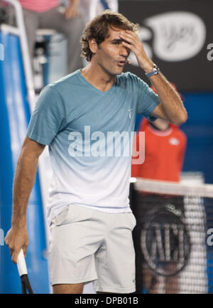 Melbourne, Australien. 11. Januar 2014. Roger Federer der Schweiz reagiert während der Kids Day-Exhibition-Match vor den Australian Open Tennis-Turnier in Melbourne, Australien, 11. Januar 2014. Bildnachweis: Bai Xue/Xinhua/Alamy Live-Nachrichten Stockfoto