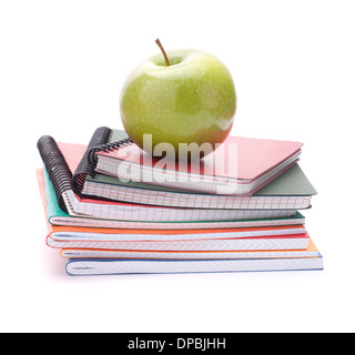 Notebook-Stack und Apfel. Schulkind und Student studiert Zubehör. Zurück zum Schulkonzept. Stockfoto