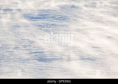 Schnee-Muster geprägt durch Winde Stockfoto