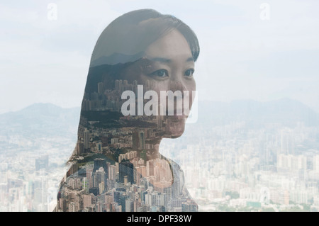 Geschäftsfrau und Hong Kong Stadtbild, zusammengesetztes Bild Stockfoto