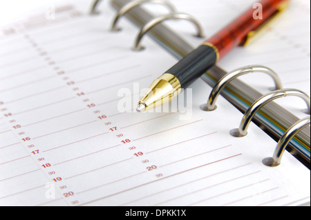 leere Zeit Planer und Stift Stockfoto