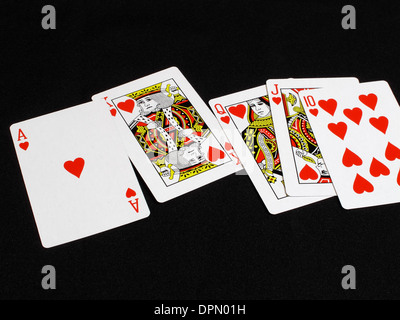 Eine Verlosung mit einem Royal Flush von zehn bis Ass der Herzen Stockfoto