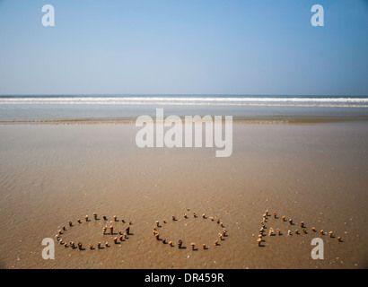 Goa in Muscheln am Meer in Betalbatim Strand geschrieben Stockfoto