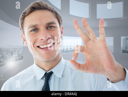 Zusammengesetztes Bild des Kaufmanns ok Anzeichen Stockfoto