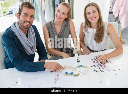 Drei Entwürfe diskutieren Modedesigner Stockfoto