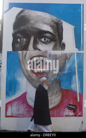 Streetart Shoreditch Spitalfields East London Bengali Mann auf Street in London Stockfoto