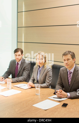 Business-Leute sitzen in treffen Stockfoto