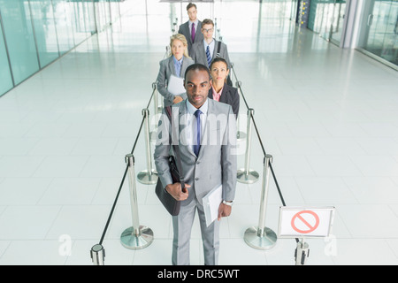 Business-Leute in der Schlange Stockfoto