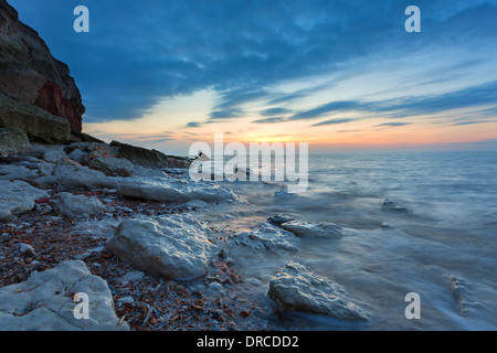 Hunstanton Sonnenuntergang über dem Meer, die Küste von North Norfolk UK Stockfoto