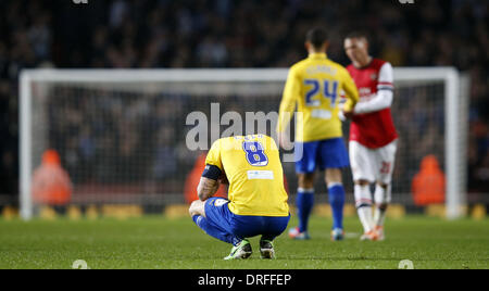 London, UK. 24. Januar 2014. Carl Baker von Coventry City sieht niedergeschlagen, nachdem FA Cup vierten Runde Spiel zwischen Arsenal und Coventry City im Emirates Stadium in London, England am 24. Januar 2014. Coventry City verlor 0-4. Bildnachweis: Wang Lili/Xinhua/Alamy Live-Nachrichten Stockfoto