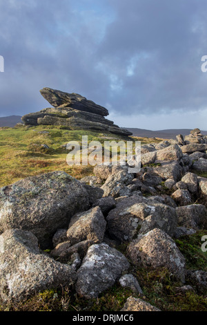 Der Logan-Stein von Iren Wand auf Belstone Common, Dartmoor, Belstone in der Nähe von Oakhampton, Devon, England, UK Stockfoto