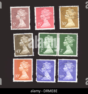 Großbritannien UK Auswahl verschiedener verwendet britische Royal Mail Briefmarken Nahaufnahme Stockfoto