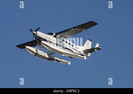 Seair Wasserflugzeuge Cessna 208 Caravan Wasserflugzeug C-GIGO in der Luft Stockfoto