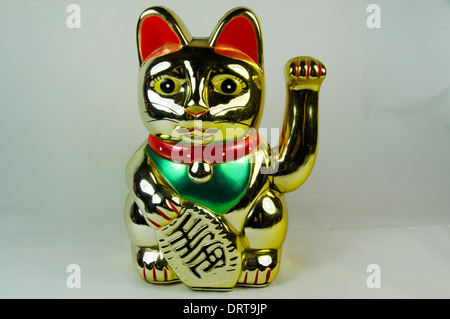 Maneki Neko japanische winken oder Beckoning Cat, Glücksbringer. Stockfoto