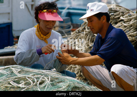 Kampō Südkorea Reparatur Netze für den nächsten Tag nach der Auktion Stockfoto