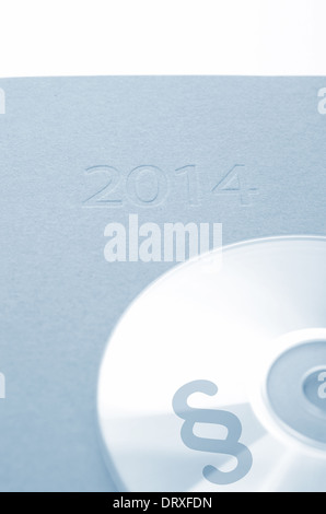 CD mit einem Absatz Symbol auf einen Kalender 2014 Stockfoto