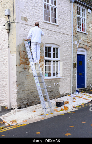 Malen ein altes Dorfhaus in Highworth, Wiltshire. Stockfoto