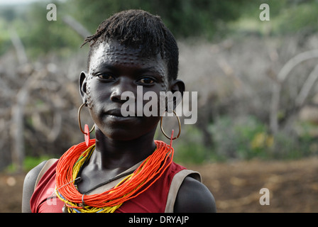 Uganda Karamoja Kotido, Karimojong Menschen, pastorale Stamm, Frau mit Gesicht scarification Stockfoto