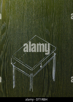 Eine Strichzeichnung Bild auf eine natürliche Holzmaserung Hintergrund einen rechteckigen Tisch mit einem freistehenden top Stockfoto