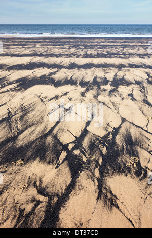 Angespült Meer Kohle, Saltburn Strand, Cleveland Stockfoto