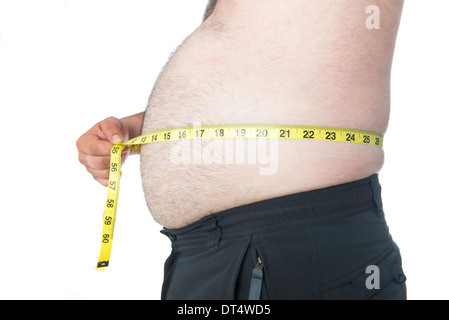 Dicker Mann mit einem dicken Bauch mit einem Maßband Stockfoto