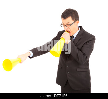 asiatische Geschäftsmann schreiend mit Megaphon über weiße jubeln Stockfoto
