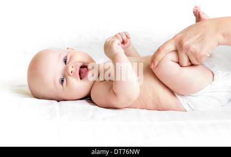 Arzt macht Gymnastik Babymädchen Stockfoto