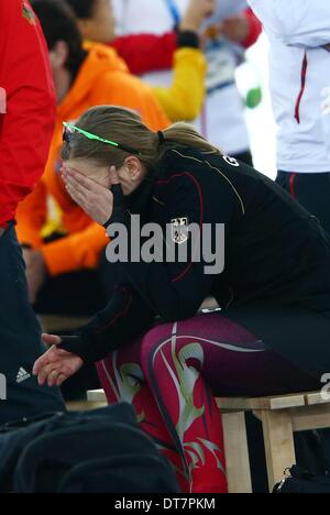 Sotschi, Russland. 11. Februar 2014. Jenny Wolf aus Deutschland reagiert nach der Damen 500 m Rennen in Adler Arena auf der 2014 Olympischen Spiele in Sotschi, Sotschi, Russland, 11. Februar 2014. Foto: Christian Charisius/Dpa/Alamy Live News Stockfoto