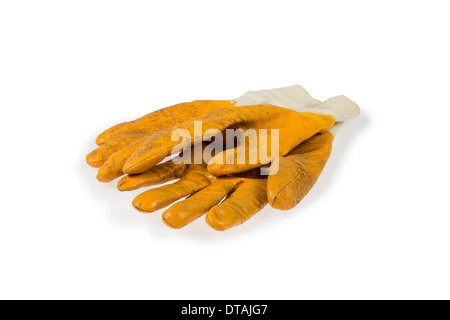 Verwendeten gelben Arbeitshandschuhe isoliert auf weißem Hintergrund Stockfoto