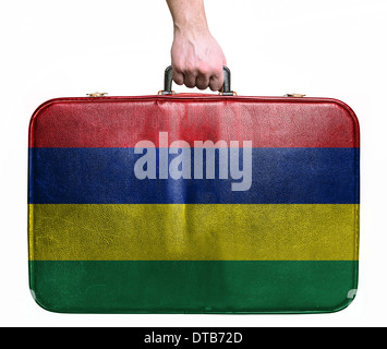 Tourist-Hand mit Vintage-Leder Reisetasche mit Flagge von Mauritius Stockfoto