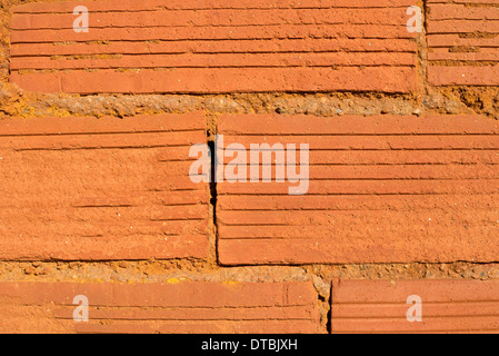 Full-Frame-Detail nehmen von einer roten Backsteinmauer Stockfoto