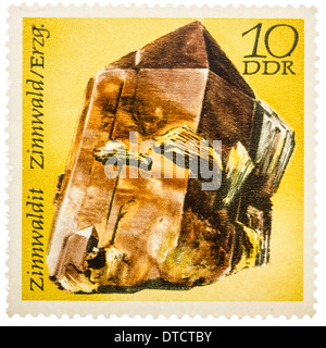 Gedruckt in der Deutschen Demokratischen Republik (DDR) Stempel zeigt Halbedelstein Zinwaldit, Mineralien Zinnwaldit, Zinnwald, Stockfoto