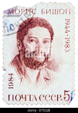 UdSSR - CIRCA 1984: Eine Briefmarke gedruckt in der UdSSR zeigt Porträt von Maurice Bishop (1944-1983), Grenada Ministerpräsident, ca. 1984 Stockfoto