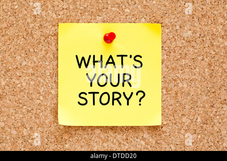 Was ist Ihre Geschichte, auf eine gelbe Zettel angeheftet auf einer Kork-Pinnwand geschrieben. Stockfoto