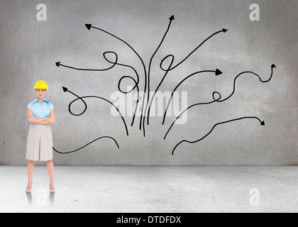 Zusammengesetztes Bild des schweren hübsche Architekten posiert Stockfoto