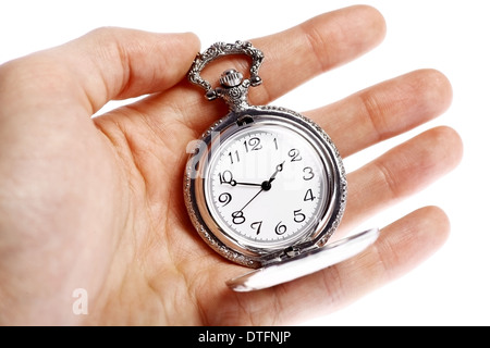 Hand mit Vintage Taschenuhr isoliert auf weißem Hintergrund Stockfoto