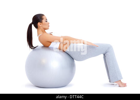 Bauchmuskeln mit Fitness-Ball zu tun Stockfoto