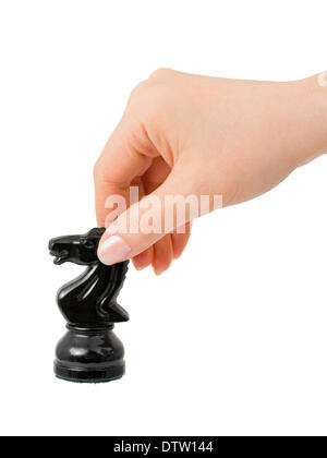Hand mit Schach Ritter Stockfoto