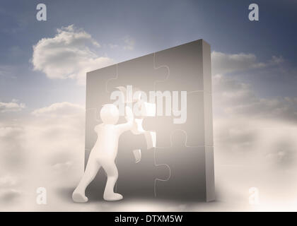 Menschliche Charakter eine Puzzle zu lösen Stockfoto