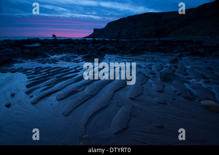 Sonnenaufgang am gegen Bay Whitby, North Yorkshire England UK Stockfoto