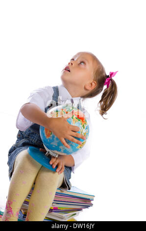 kleine Mädchen und Bücher Stockfoto