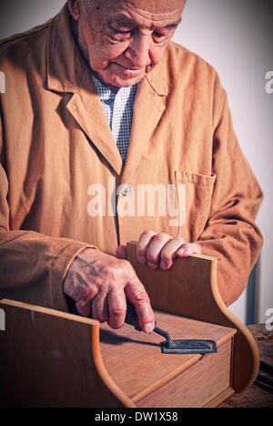 Senior-Tischler Stockfoto