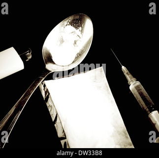 gekochte Heroin mit Spritze und Kokain sack Stockfoto