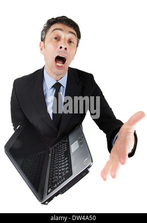 humorvolle hohen Winkel in voller Länge Portrait von eine geschwätzige Geschäftsmann mit einem offenen Notebook mit seinem Mund weit offen und Gestikulieren Stockfoto
