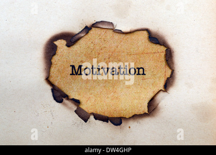 Motivation-Text auf Papier Loch Stockfoto
