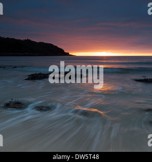 Sonnenaufgang am Schloss Beach in Falmouth Stockfoto