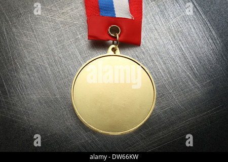 Metall-Medaille auf kratzende Hintergrund Stockfoto