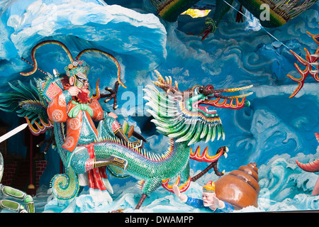Singapur - 1. Februar 2014: Neptun reiten Drachen in die acht unsterblichen, die eindringenden Neptun Palast Diorama in der Haw Par Villa Stockfoto